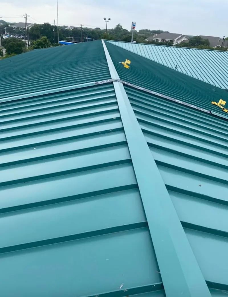 Green commercial metal roof ridge and valley for Metal Roof Repair in Gallatin