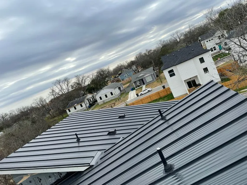 Standing seam metal roof panels with vents for Skylight Repair in Gallatin